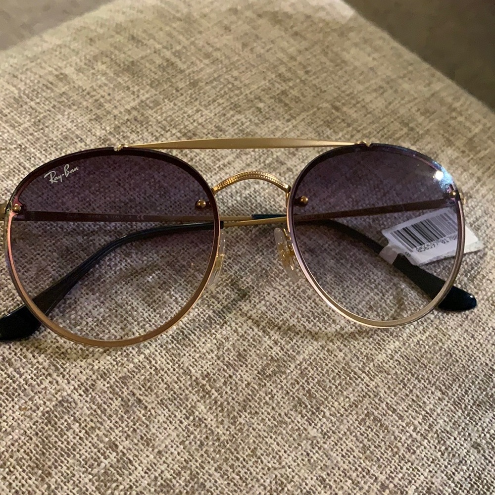 Ray-Ban sunglasses with gold frame